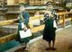 Japan: Two young schoolboys on their way to school, c.1910